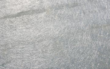 Herniss laminate fibreglass or shingles?